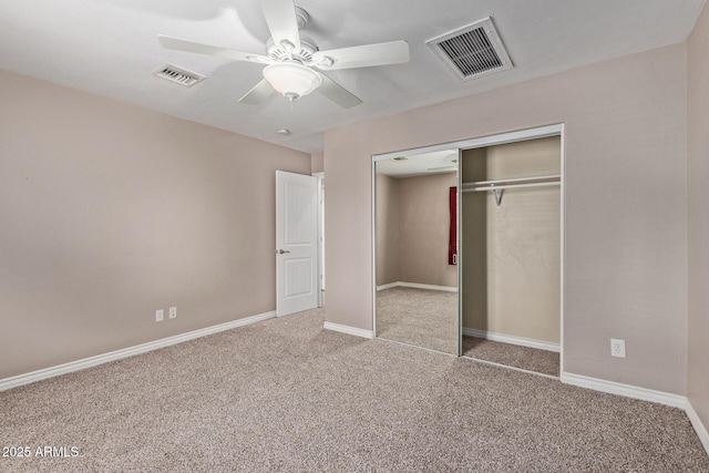 3034 E Turney Ave, Phoenix, AZ 85016 - unfurnished bedroom featuring carpet floors, a closet, baseboards, and ceiling fan