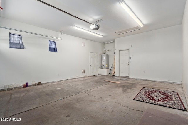 3034 E Turney Ave, Phoenix, AZ 85016 - garage featuring gas water heater and a garage door opener