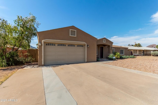 3034 E Turney Ave, Phoenix, AZ 85016 - view of front of home with stucco siding and driveway