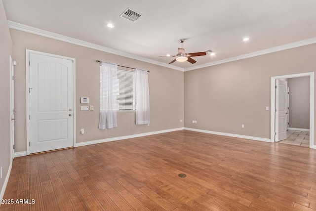 3034 E Turney Ave, Phoenix, AZ 85016 - empty room featuring ceiling fan, crown molding, light wood finished floors, baseboards, and recessed lighting