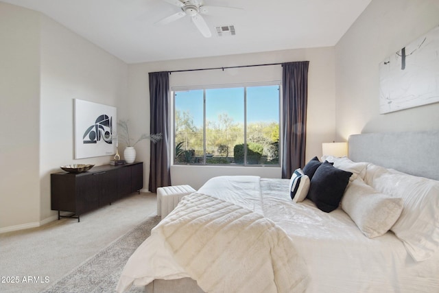 bedroom with radiator, ceiling fan, and carpet