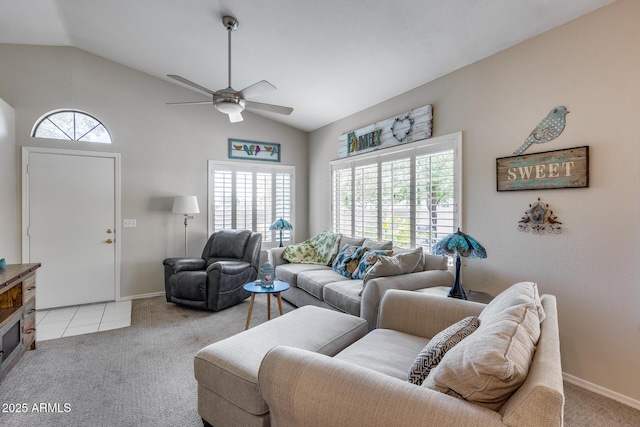 14300 W Bell Rd Unit 312, Surprise, AZ 85374 - living room with lofted ceiling, light colored carpet, a ceiling fan, and baseboards