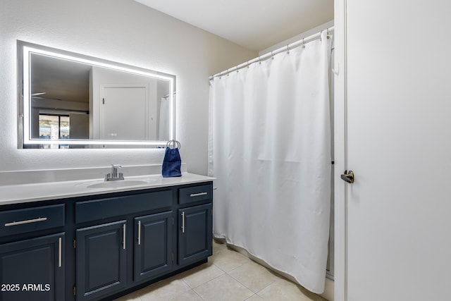 14300 W Bell Rd Unit 312, Surprise, AZ 85374 - bathroom with vanity, tile patterned flooring, and curtained shower