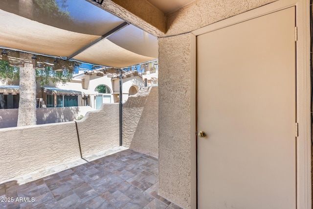 14300 W Bell Rd Unit 312, Surprise, AZ 85374 - view of patio / terrace with a balcony