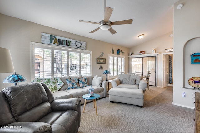 14300 W Bell Rd Unit 312, Surprise, AZ 85374 - living area featuring ceiling fan, light colored carpet, vaulted ceiling, and baseboards