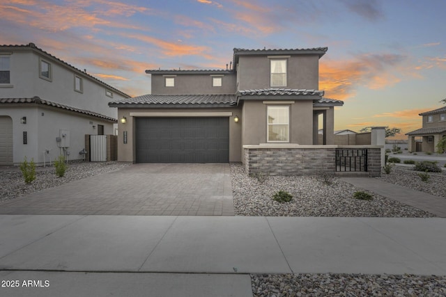 21241 E Superstition Dr, Queen Creek, AZ 85142 - view of front of house with fence, a tiled roof, stucco siding, driveway, and a gate