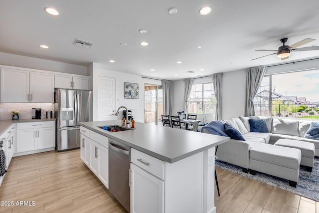 21241 E Superstition Dr, Queen Creek, AZ 85142 - kitchen featuring a sink, visible vents, appliances with stainless steel finishes, and open floor plan