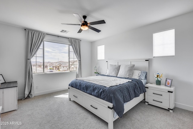 21241 E Superstition Dr, Queen Creek, AZ 85142 - bedroom featuring visible vents, light carpet, baseboards, and ceiling fan