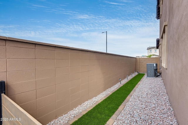 21241 E Superstition Dr, Queen Creek, AZ 85142 - view of yard featuring cooling unit and a fenced backyard