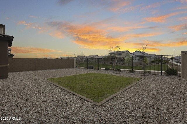 21241 E Superstition Dr, Queen Creek, AZ 85142 - yard at dusk featuring a residential view and fence
