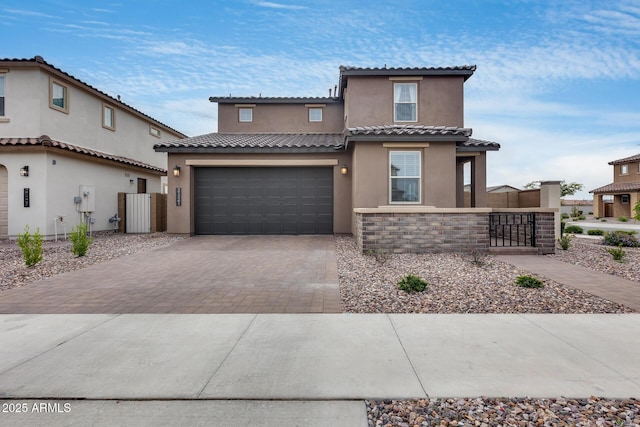 21241 E Superstition Dr, Queen Creek, AZ 85142 - mediterranean / spanish home with a tile roof, decorative driveway, fence, and stucco siding