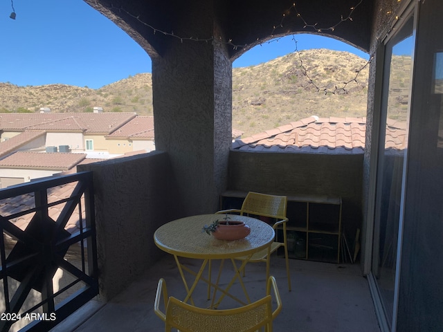 balcony featuring a mountain view