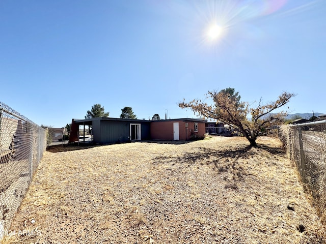 view of yard with a carport