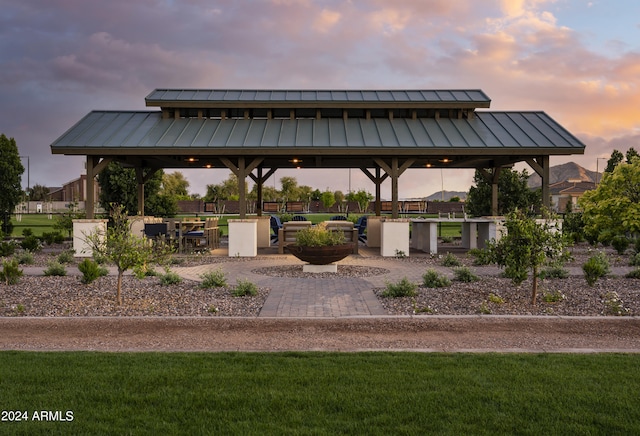 24022 S 218th Pl, Queen Creek, AZ 85142 - view of community featuring a gazebo, a patio area, and an outdoor living space with a fire pit