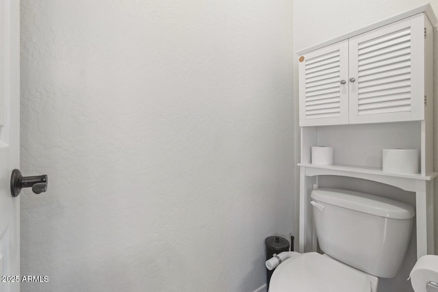 16559 W Lincoln St, Goodyear, AZ 85338 - bathroom with toilet and baseboards