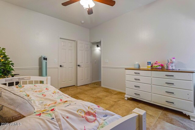 16559 W Lincoln St, Goodyear, AZ 85338 - bedroom with a ceiling fan and light tile patterned floors