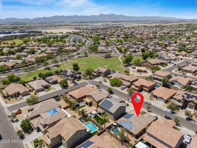 16559 W Lincoln St, Goodyear, AZ 85338 - aerial view of property and surrounding area featuring a mountain backdrop and nearby suburban area