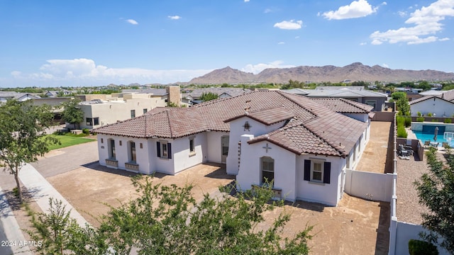 drone / aerial view featuring a mountain view