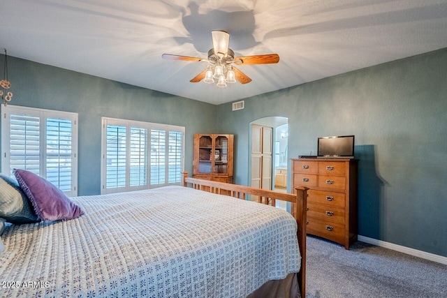 bedroom with ceiling fan and carpet flooring