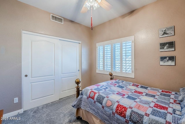 bedroom featuring carpet floors, a closet, and ceiling fan