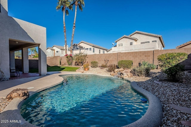 view of pool with pool water feature