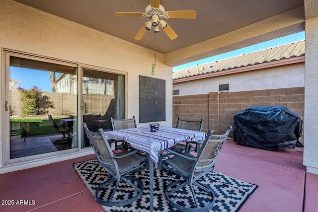 view of patio / terrace with a grill and ceiling fan