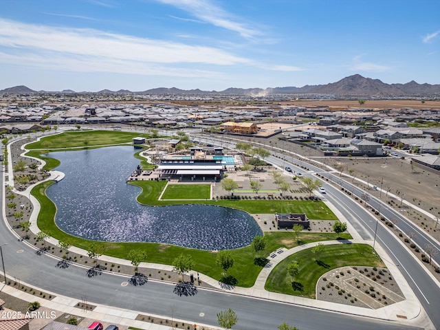 bird's eye view featuring a residential view and a water and mountain view