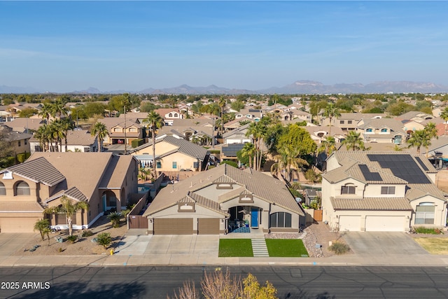 bird's eye view with a mountain view and a residential view