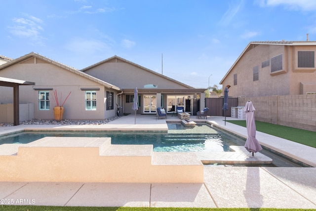 view of pool featuring a fenced in pool, a patio area, and fence