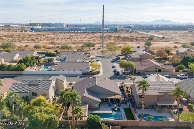 birds eye view of property featuring a residential view and a mountain view