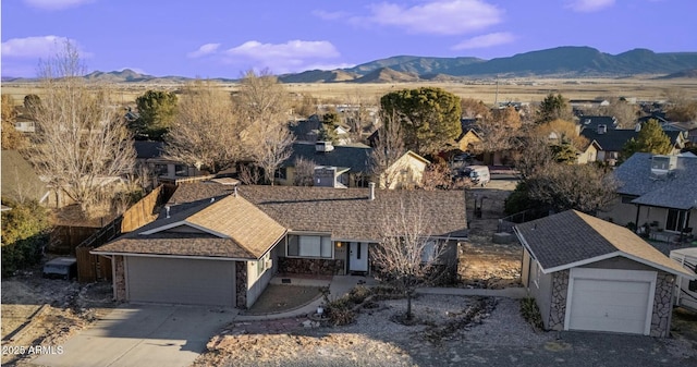 bird's eye view with a residential view and a mountain view