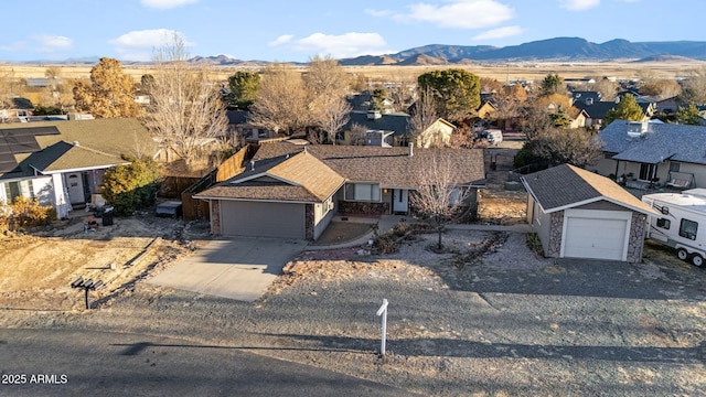 birds eye view of property featuring a residential view and a mountain view