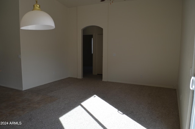 empty room with carpet flooring