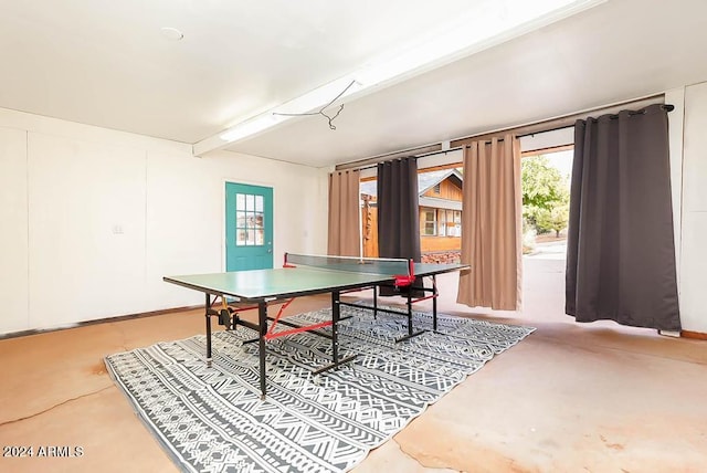 playroom featuring concrete flooring