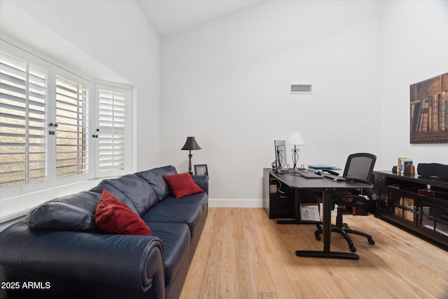 office area with wood-type flooring