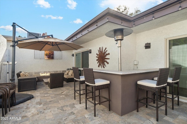 view of patio / terrace featuring a bar