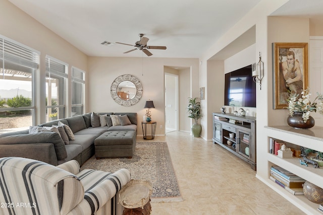 living room featuring ceiling fan