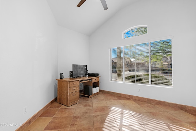 office area with ceiling fan, high vaulted ceiling, and light tile patterned floors