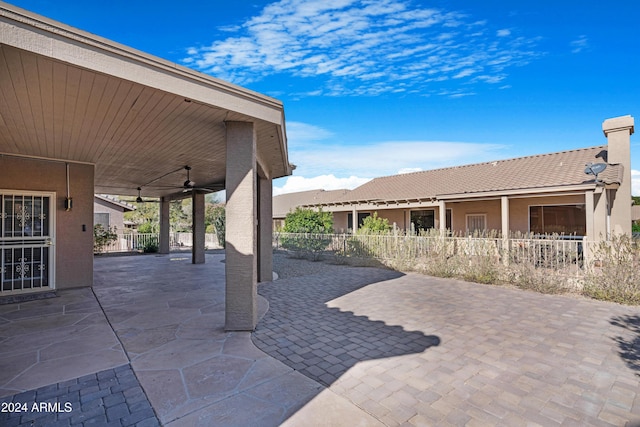 view of patio / terrace featuring ceiling fan