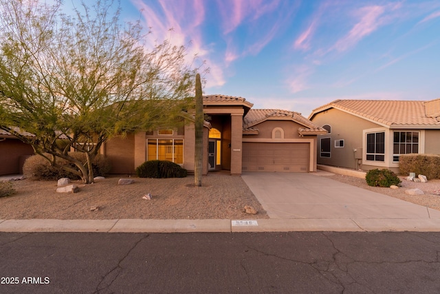 view of front of house with a garage