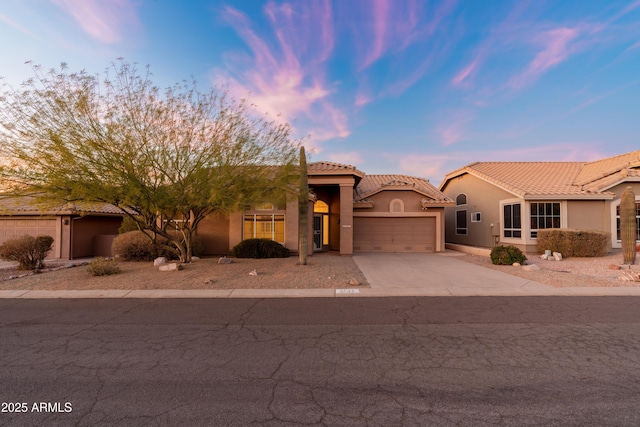 view of front of property featuring a garage