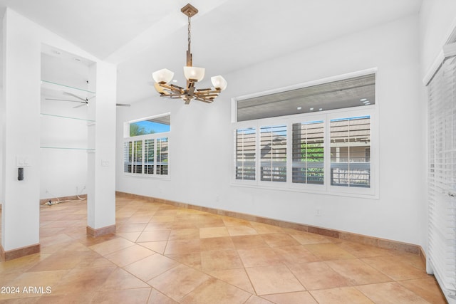 unfurnished dining area with an inviting chandelier and light tile patterned floors