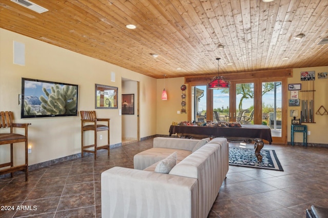 tiled living room with french doors and wood ceiling