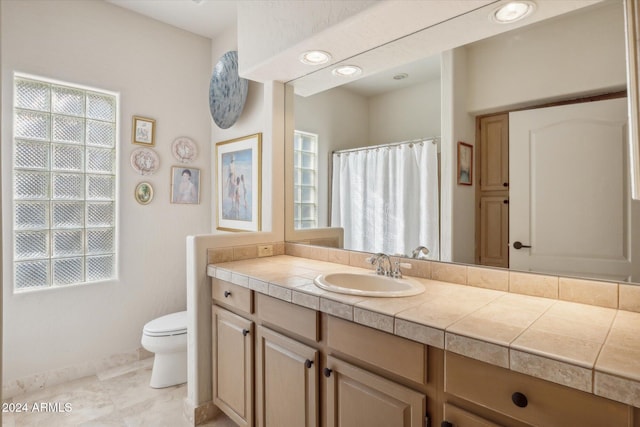 25210 N 90th Way, Scottsdale, AZ 85255 - bathroom with toilet, vanity, baseboards, and a shower with curtain