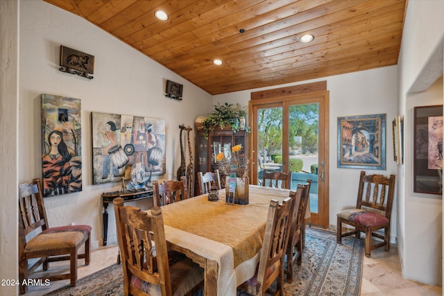 dining area featuring wooden ceiling and vaulted ceiling