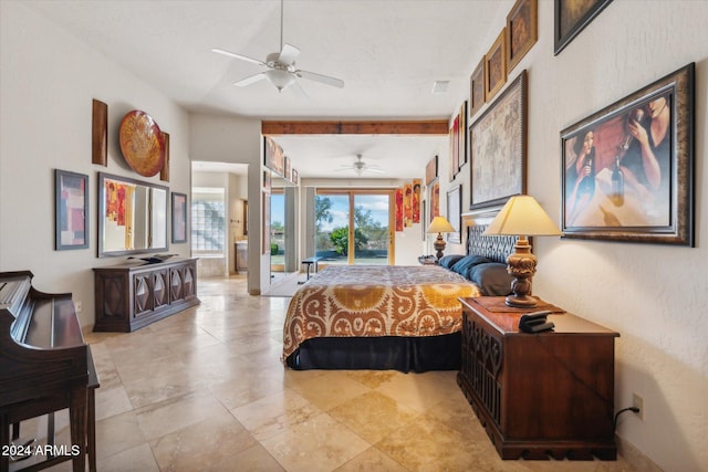 bedroom featuring ceiling fan and ensuite bathroom