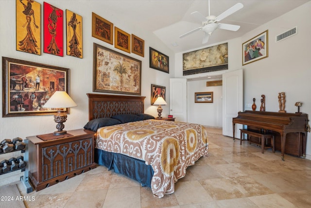 bedroom with ceiling fan and high vaulted ceiling