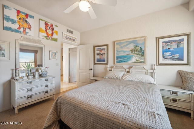 carpeted bedroom with ceiling fan