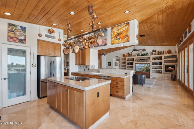 25210 N 90th Way, Scottsdale, AZ 85255 - kitchen with stainless steel appliances, wooden ceiling, a kitchen island, open floor plan, and a peninsula