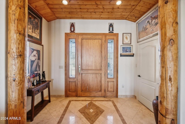 entryway with lofted ceiling and wooden ceiling